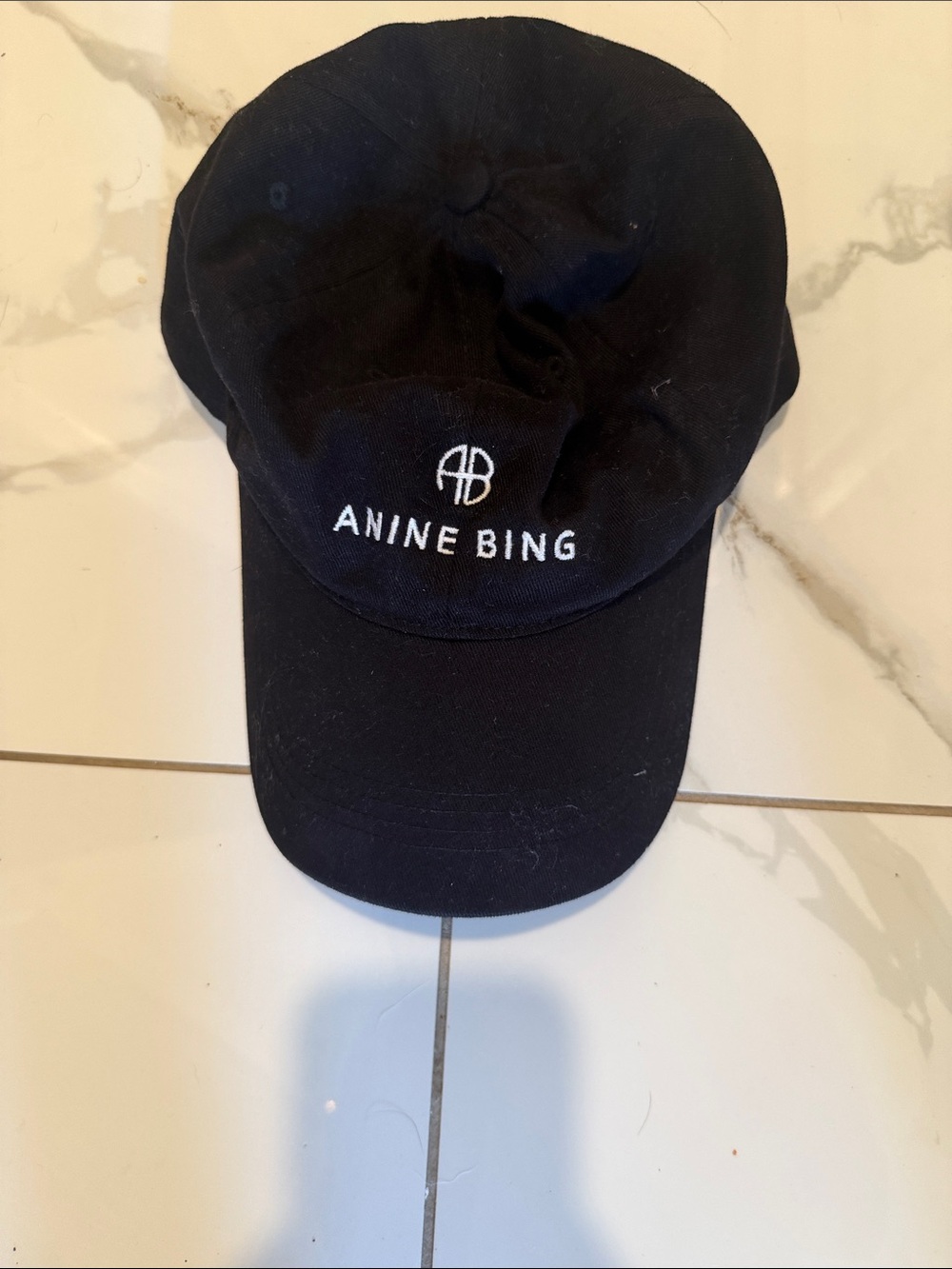 Anine bing baseball cap in black with white logo.